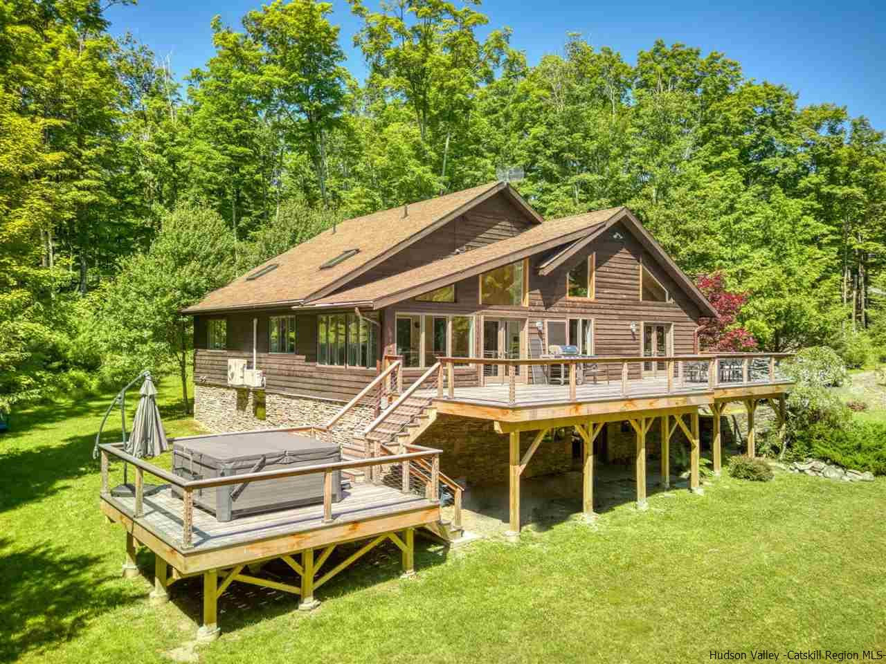 215 Sheldon Hill Road Olivebridge, NY 12461 - Photo 2 of 32 a front view of a house with a garden