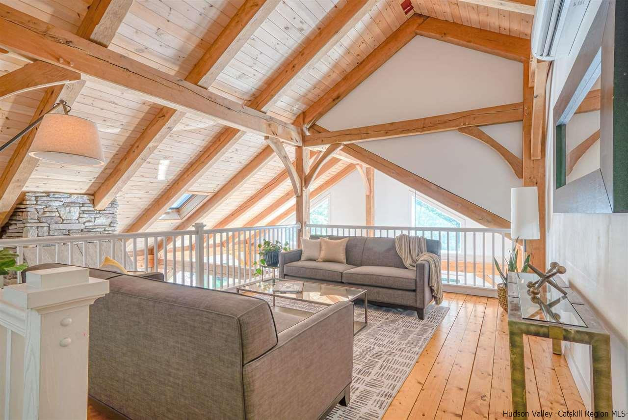 215 Sheldon Hill Road Olivebridge, NY 12461 - Photo 22 of 32 a balcony with furniture and a couch