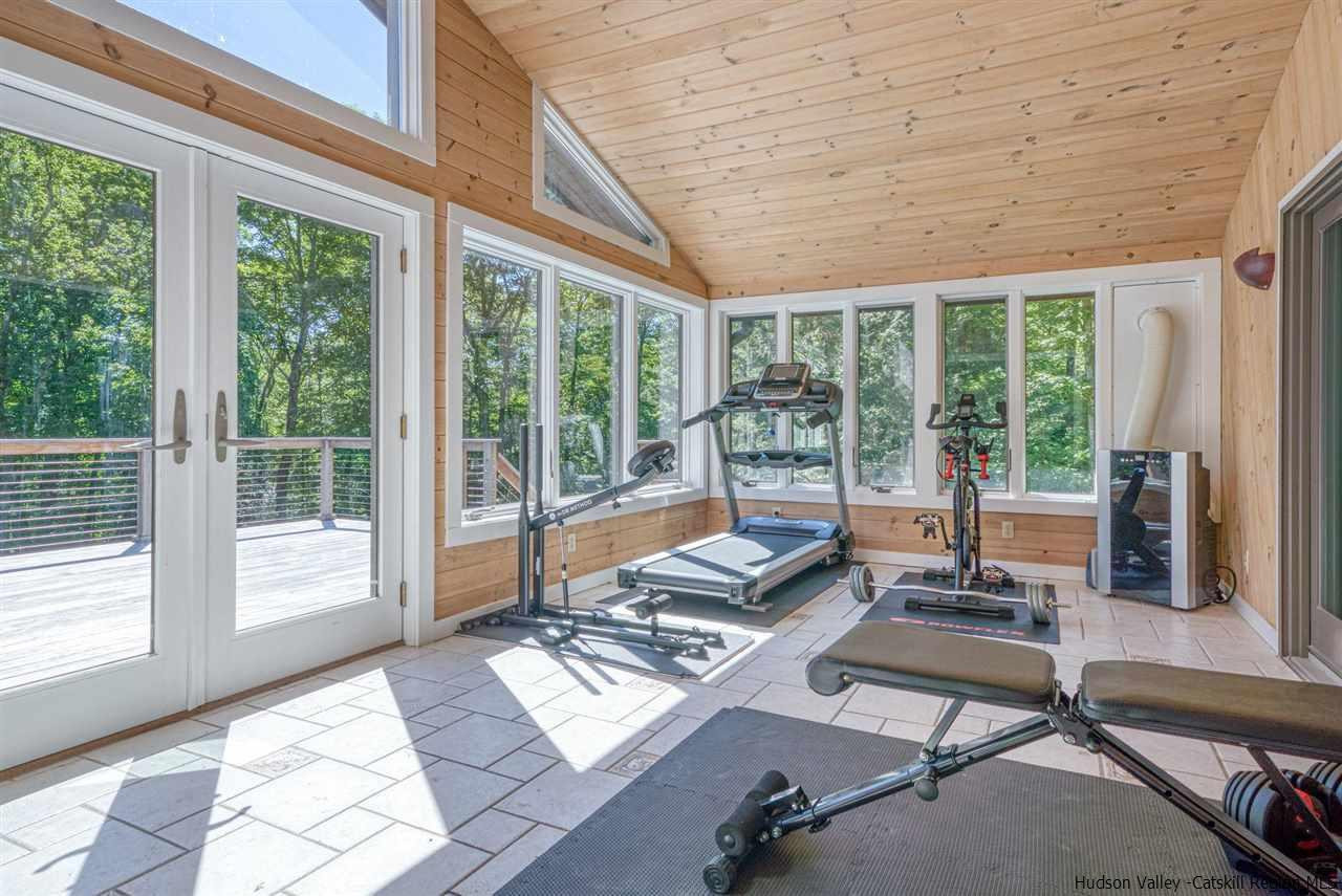 215 Sheldon Hill Road Olivebridge, NY 12461 - Photo 28 of 32 a living room with furniture and floor to ceiling windows