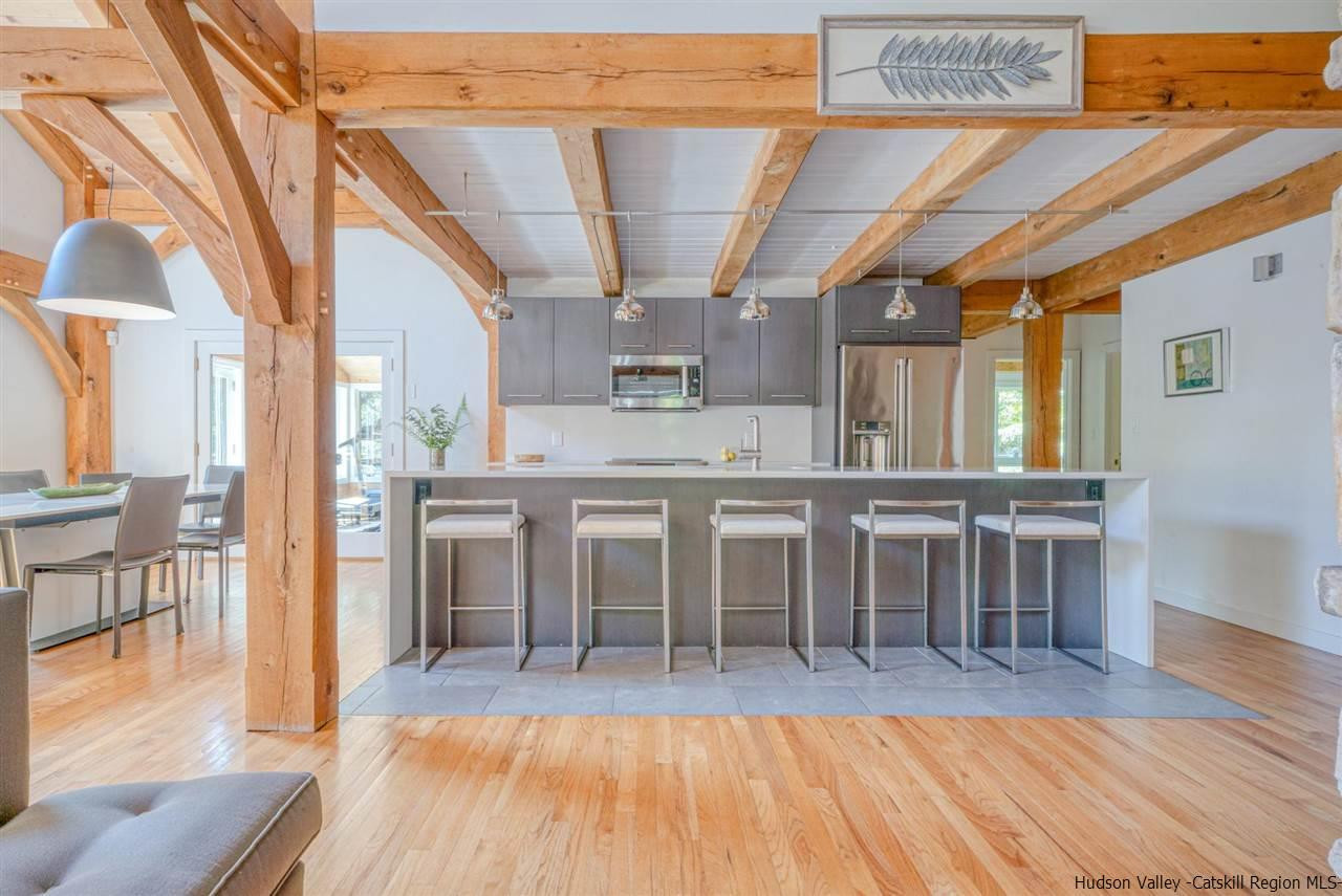 215 Sheldon Hill Road Olivebridge, NY 12461 - Photo 3 of 32 a dining hall with stainless steel appliances wooden floors stove and kitchen view