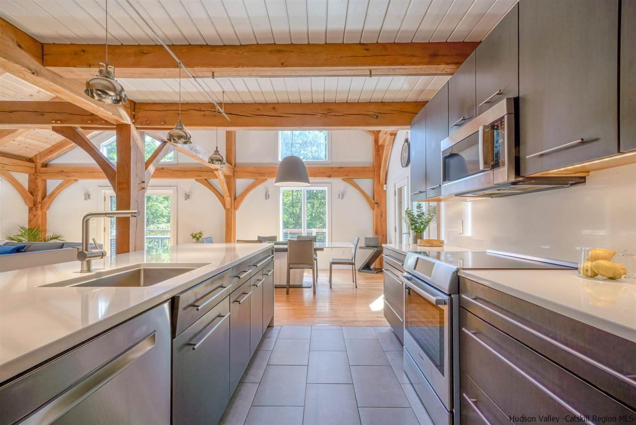 215 Sheldon Hill Road Olivebridge, NY 12461 - Photo 5 of 32 a kitchen with a sink and a stove top oven