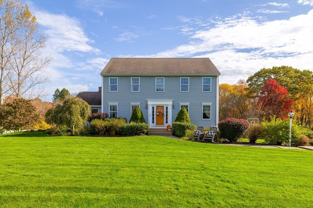 5 Kayla Lane Dudley, MA 01571 - Photo 1 of 32 a brick house with a big yard and front view of a house