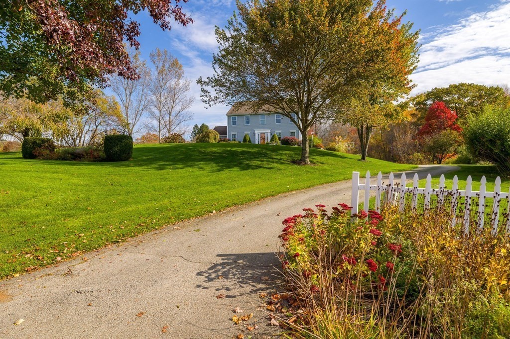 5 Kayla Lane Dudley, MA 01571 - Photo 2 of 32 a view of a park with large trees