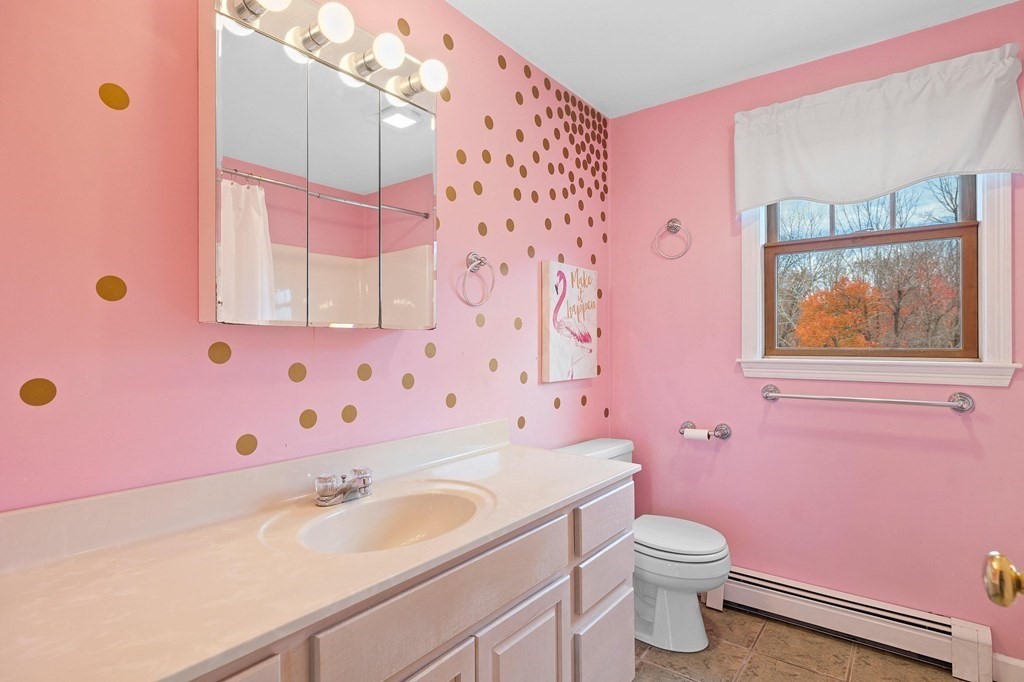5 Kayla Lane Dudley, MA 01571 - Photo 25 of 32 a bathroom with a sink toilet and mirror