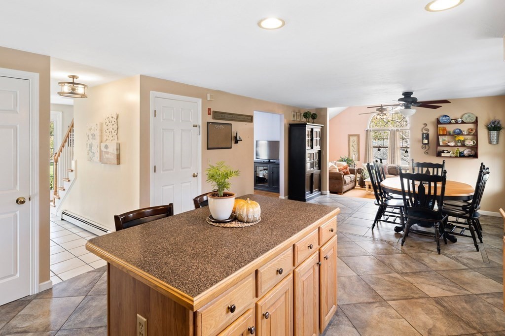 5 Kayla Lane Dudley, MA 01571 - Photo 4 of 32 a kitchen with a table and chairs
