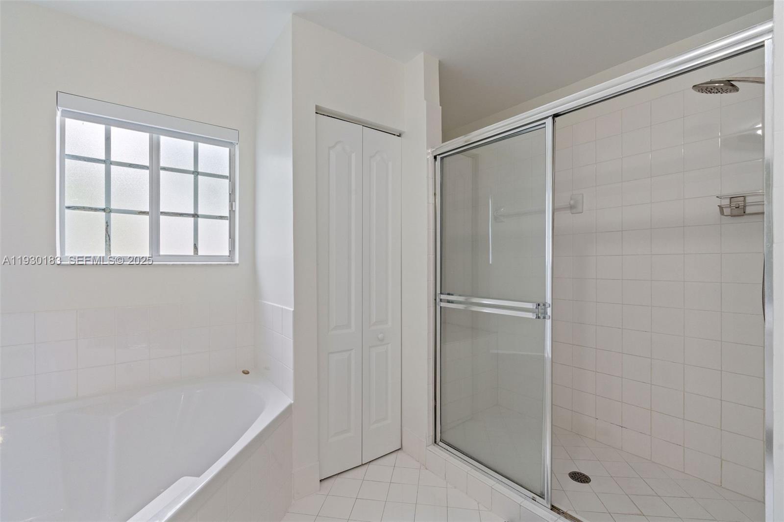 14152 Southwest 154th Court Miami, FL 33196 - Photo 23 of 33 a bathroom with a bathtub