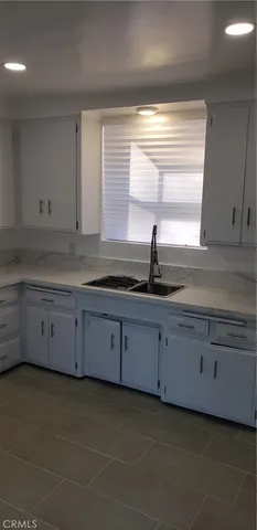 a bathroom with a sink and toilet