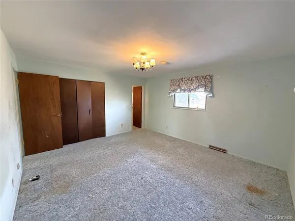 a view of empty room with windows