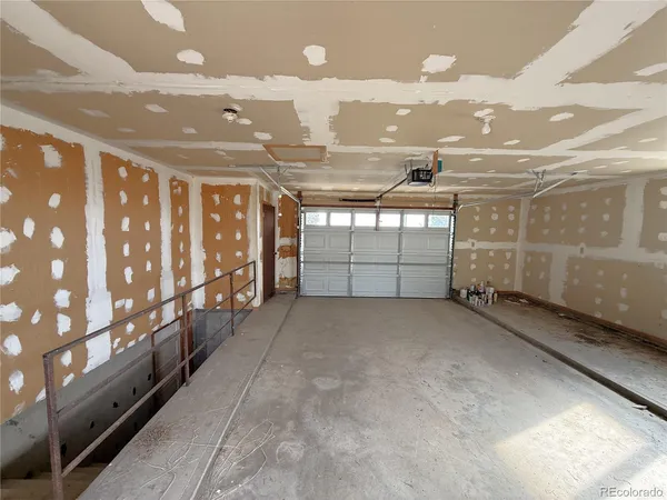 a view of a big room with windows