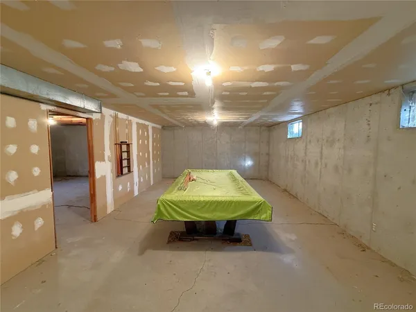 a view of an empty room with a sliding door