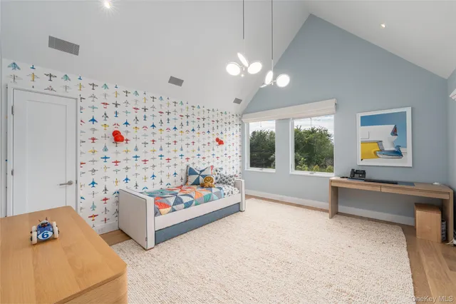 a bedroom with furniture and a couch