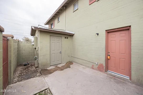a view of a house with backyard space