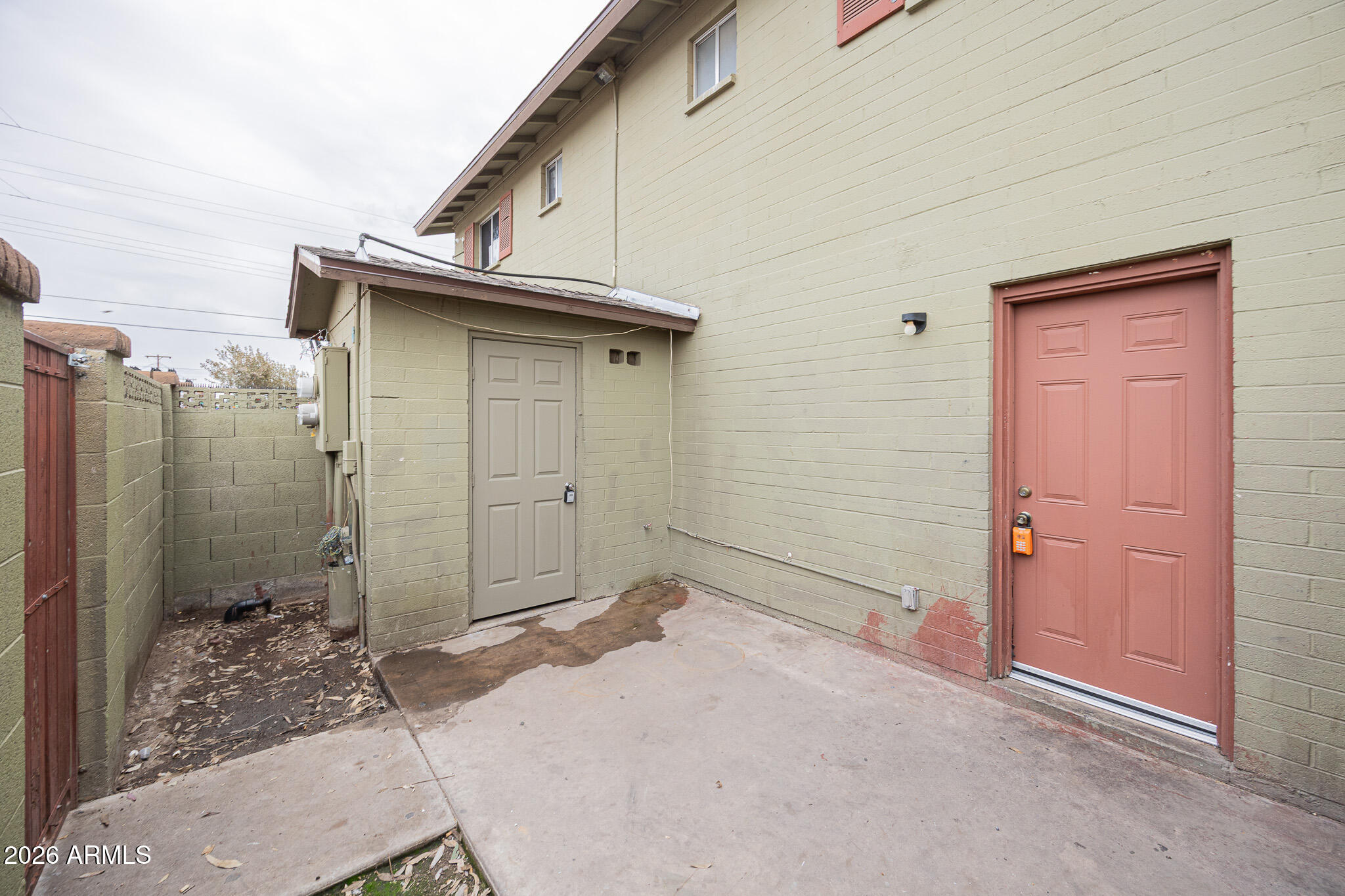 4615 North 39th Avenue, Unit 24 Phoenix, AZ 85019 - Photo 15 of 17 a view of a house with backyard space