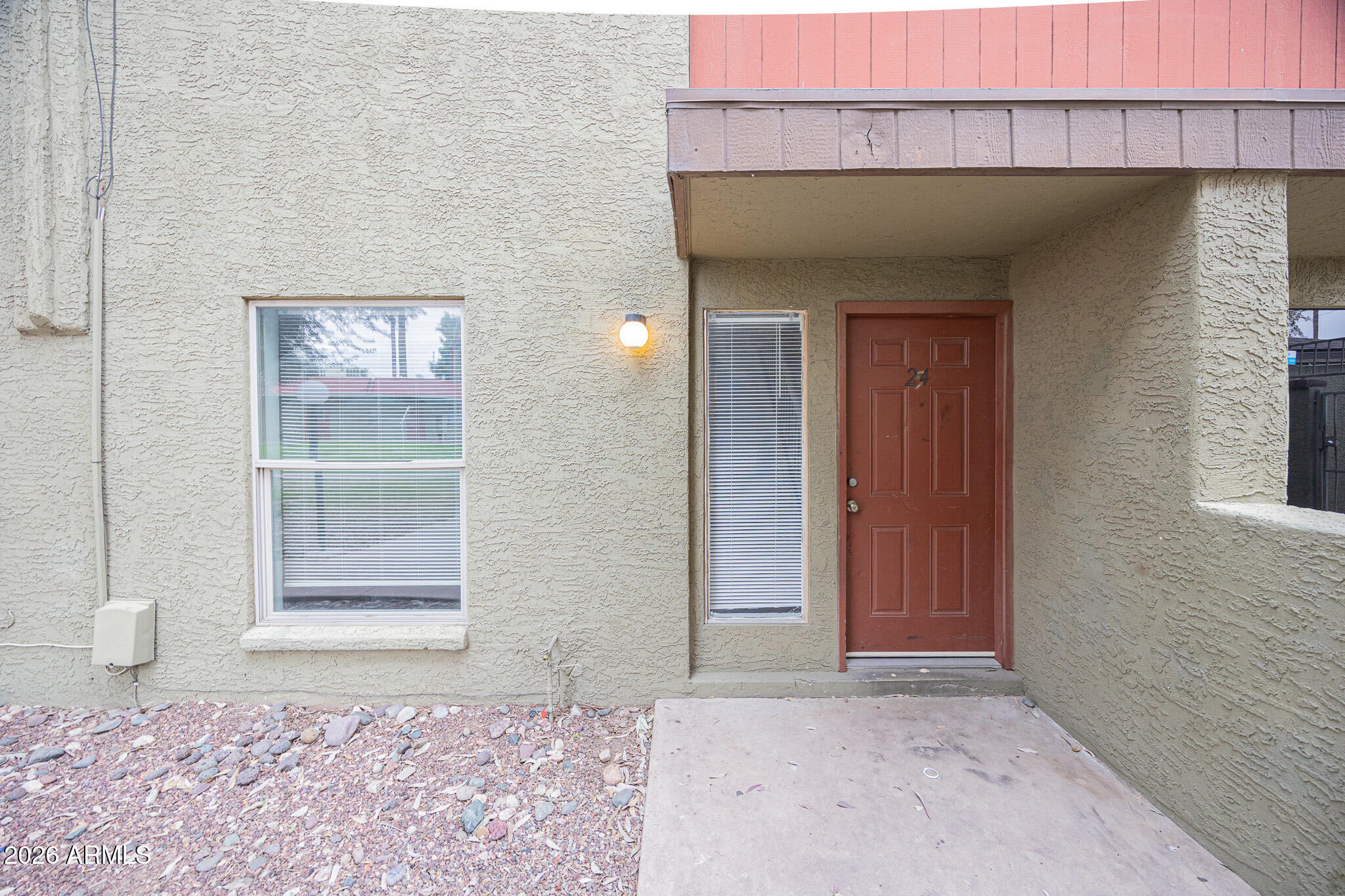 4615 North 39th Avenue, Unit 24 Phoenix, AZ 85019 - Photo 2 of 17 a front view of a house