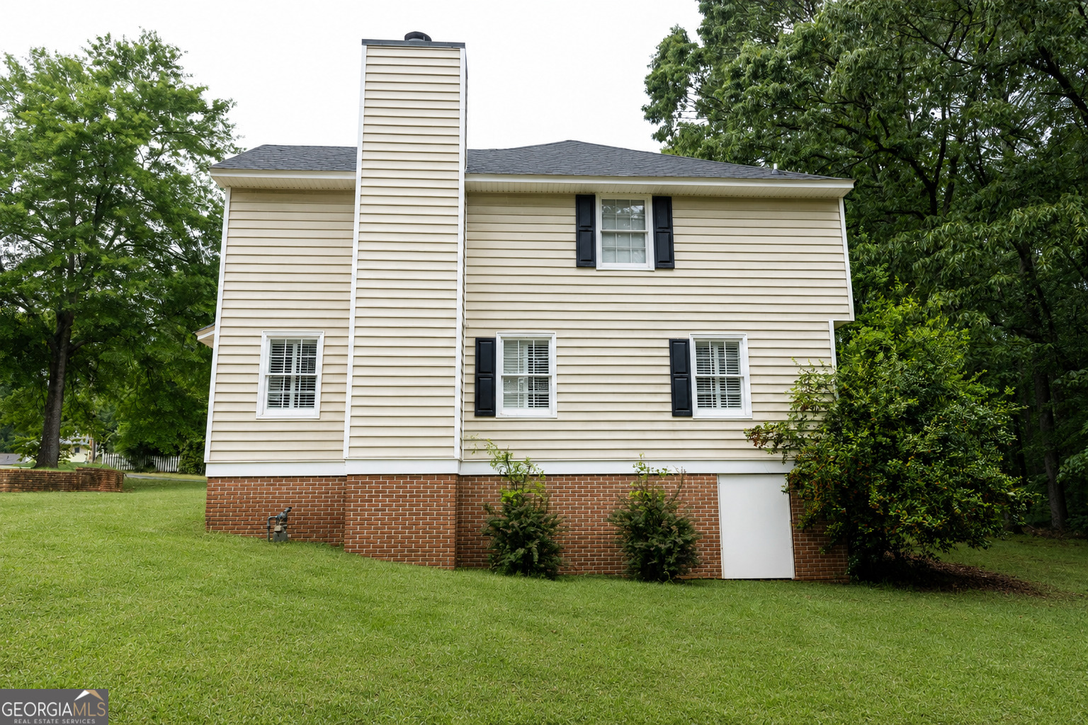 124 David Drive Thomaston, GA 30286 - Photo 43 of 43 a house that has a garden