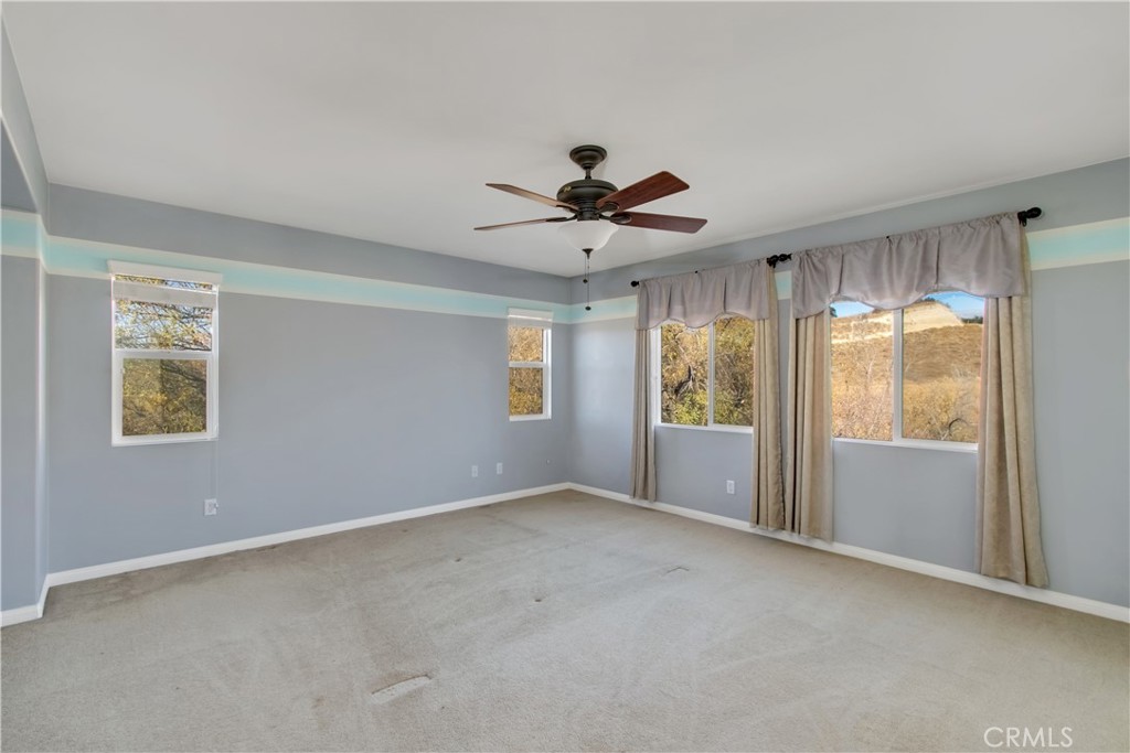 34020 Crenshaw Street Beaumont, CA 92223 - Photo 17 of 36 a view of an empty room with a window