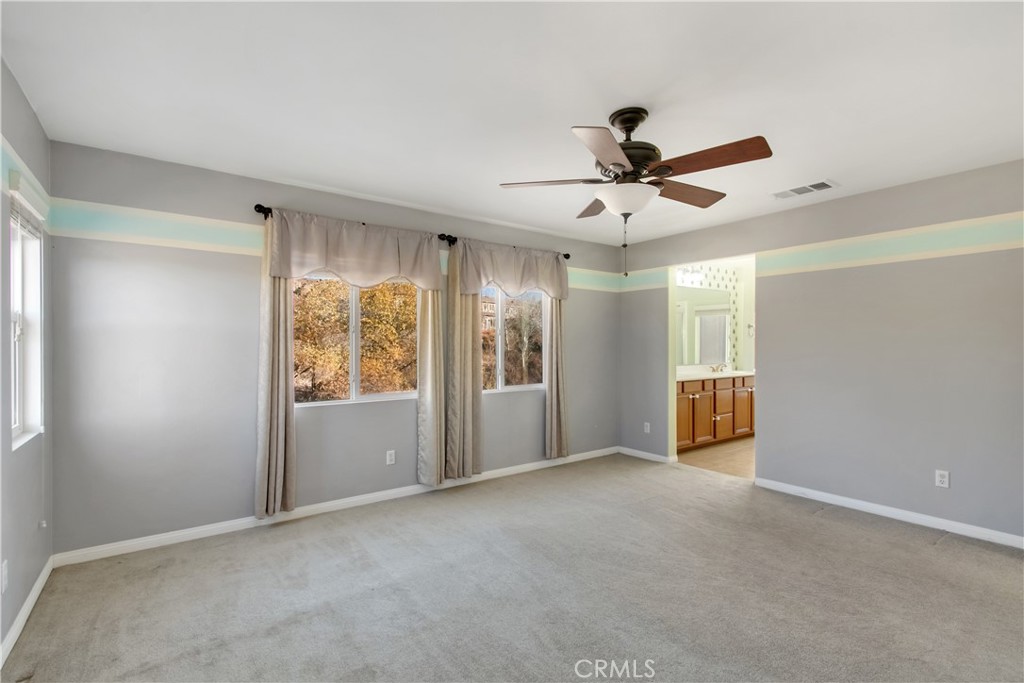 34020 Crenshaw Street Beaumont, CA 92223 - Photo 20 of 36 a view of an empty room with a window