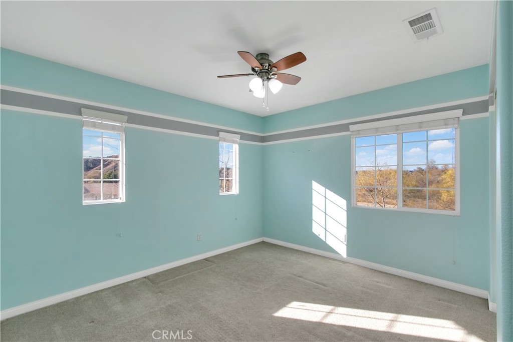 34020 Crenshaw Street Beaumont, CA 92223 - Photo 24 of 36 a view of an empty room with a window