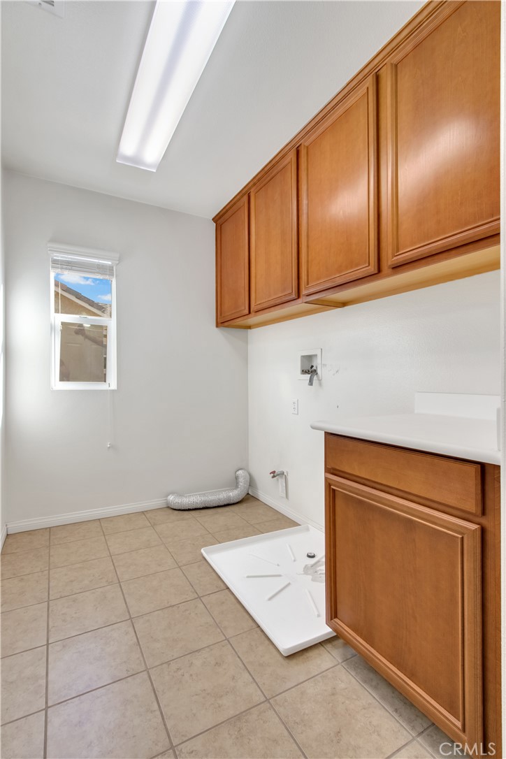 34020 Crenshaw Street Beaumont, CA 92223 - Photo 29 of 36 a view of a storage area with cabinets