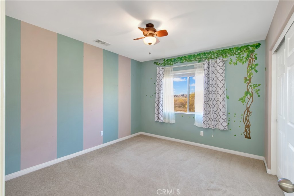 34020 Crenshaw Street Beaumont, CA 92223 - Photo 30 of 36 a view of an empty room with a window