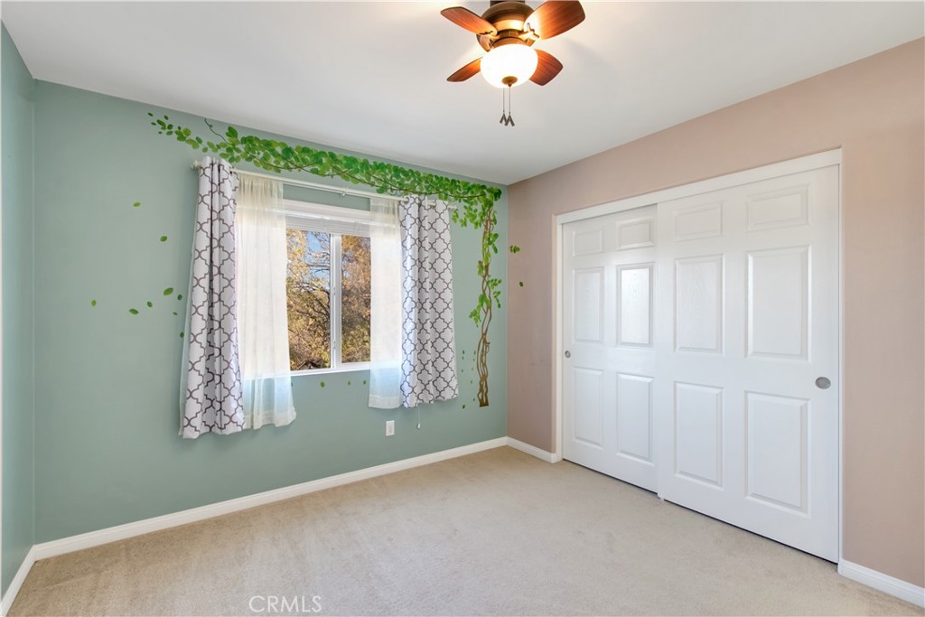 34020 Crenshaw Street Beaumont, CA 92223 - Photo 31 of 36 a view of an empty room with a window