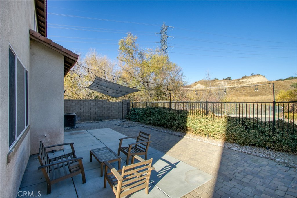 34020 Crenshaw Street Beaumont, CA 92223 - Photo 36 of 36 a view of a balcony with two chairs and a table
