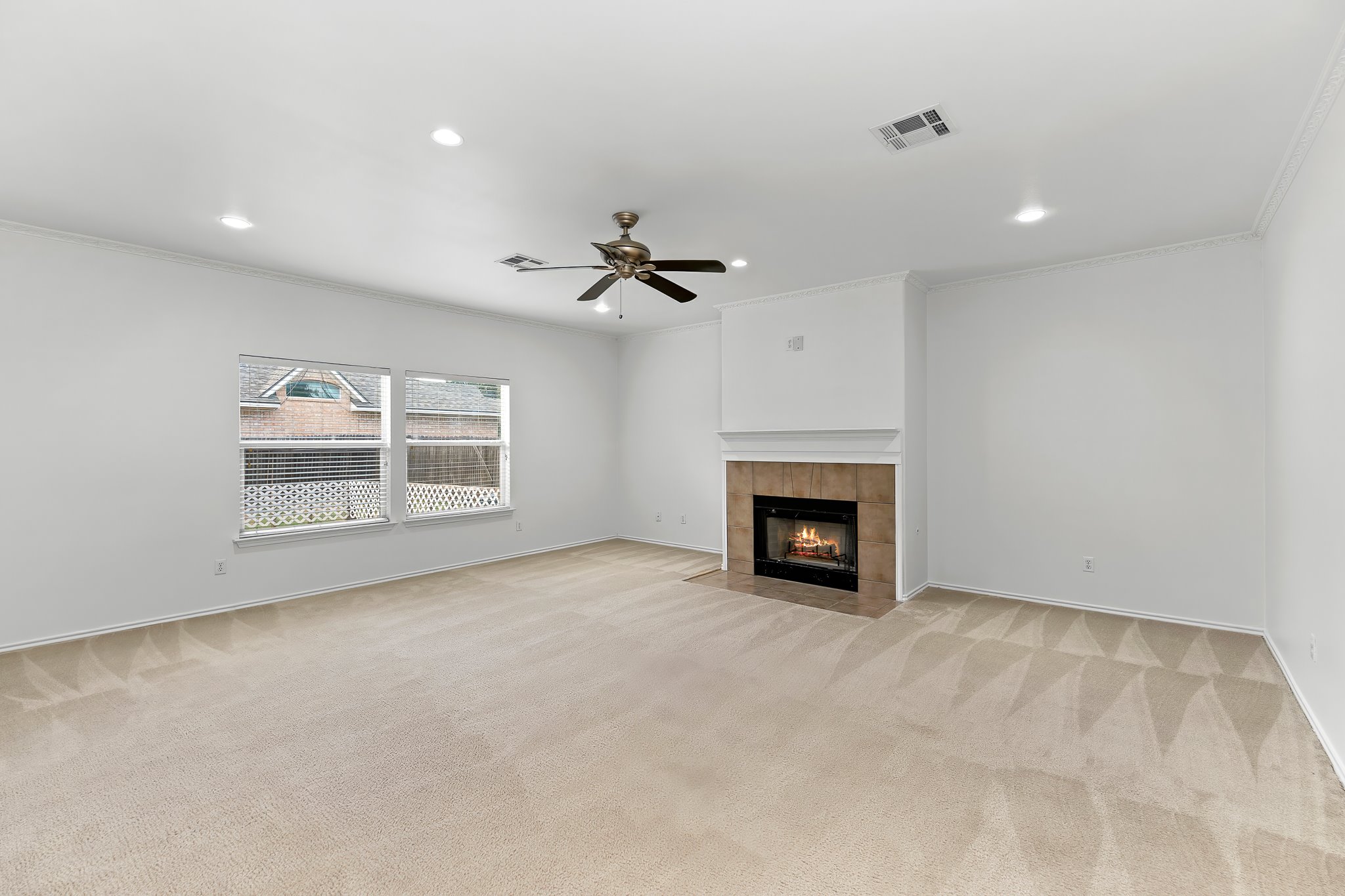 6700 Tulloch Way Austin, TX 78754 - Photo 20 of 39 a view of an empty room with a fireplace