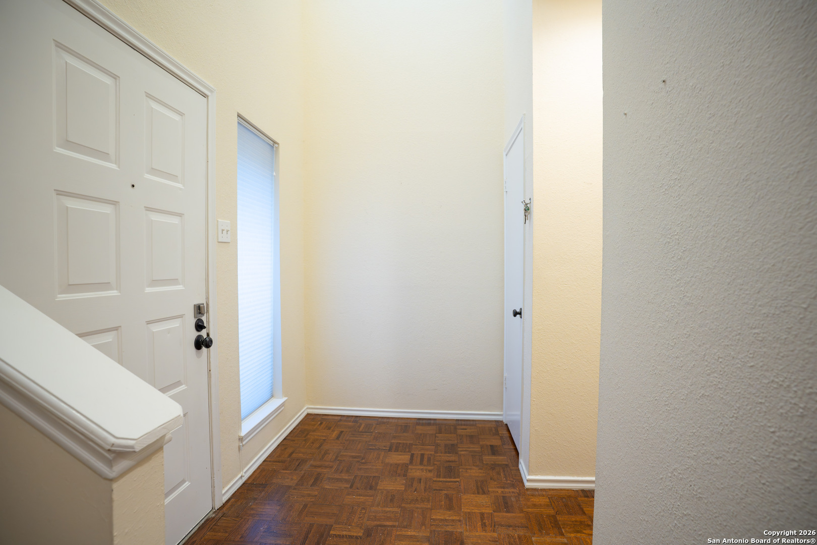 11001 Wurzbach Road, Unit 401 San Antonio, TX 78230 - Photo 12 of 12 a view of a hallway with white walls