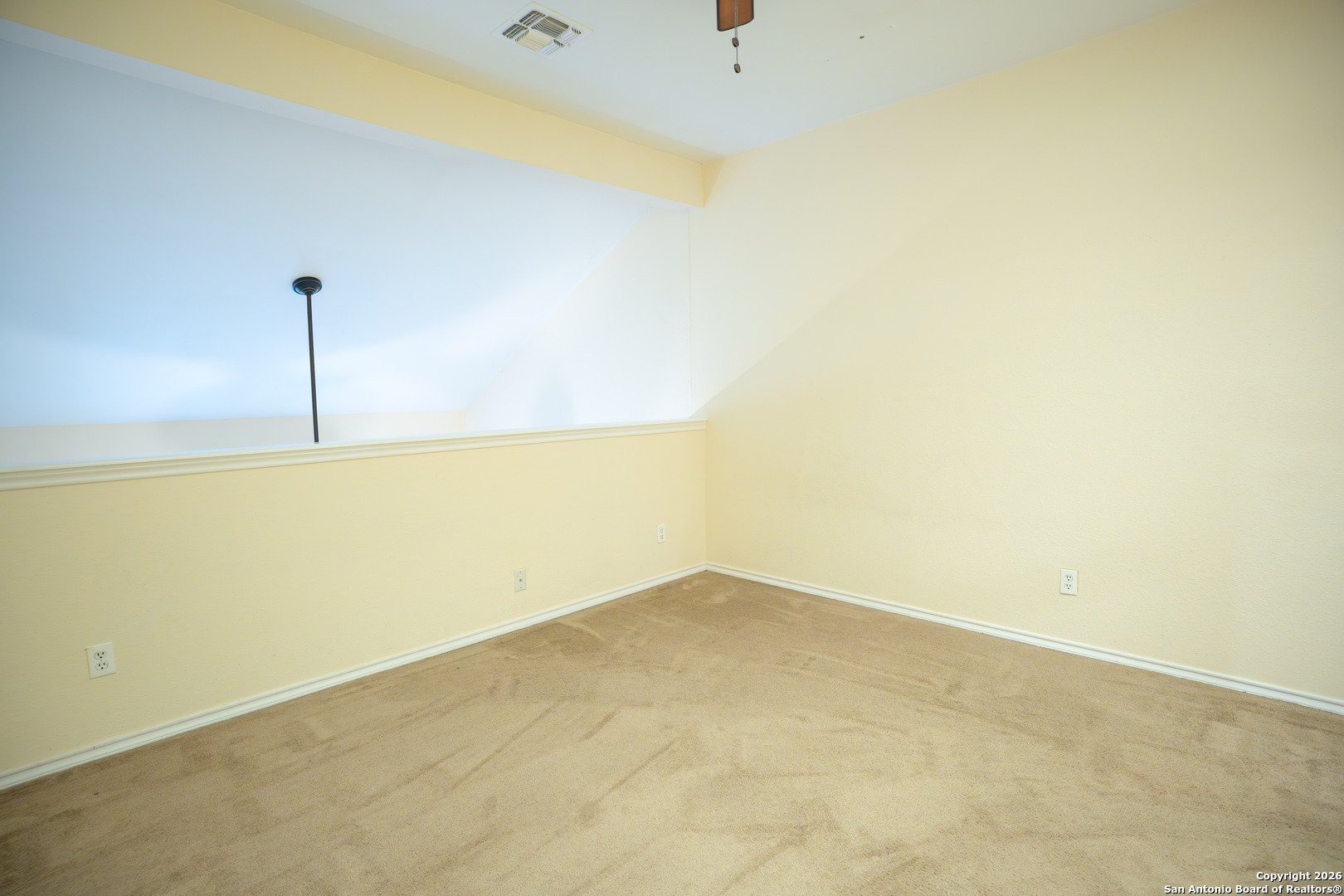 11001 Wurzbach Road, Unit 401 San Antonio, TX 78230 - Photo 5 of 12 a view of a room with a fan