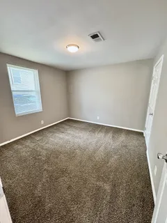 an empty room with a natural light