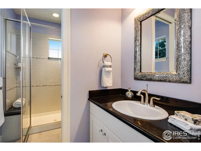a view of a hardwood floor and wardrobe