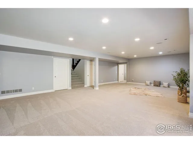 a view of a livingroom with a potted plant