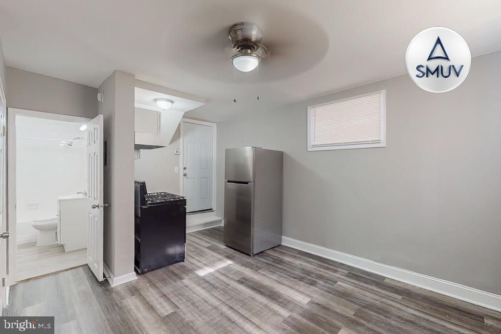 1605 Homestead Street, Unit 12 Baltimore, MD 21218 - Photo 2 of 12 a view of kitchen with refrigerator and window