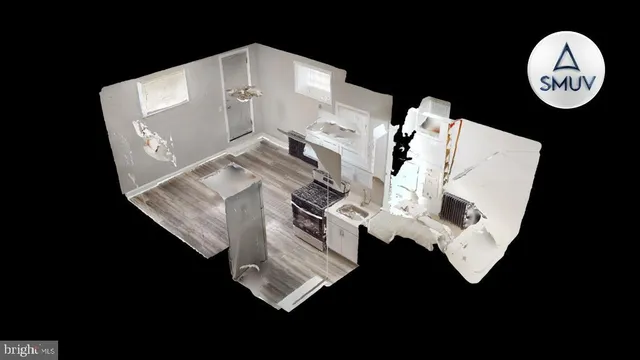 a view of empty room with window and wooden floor