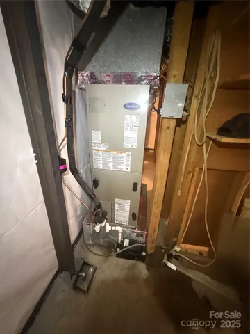 a view of an empty room with furniture