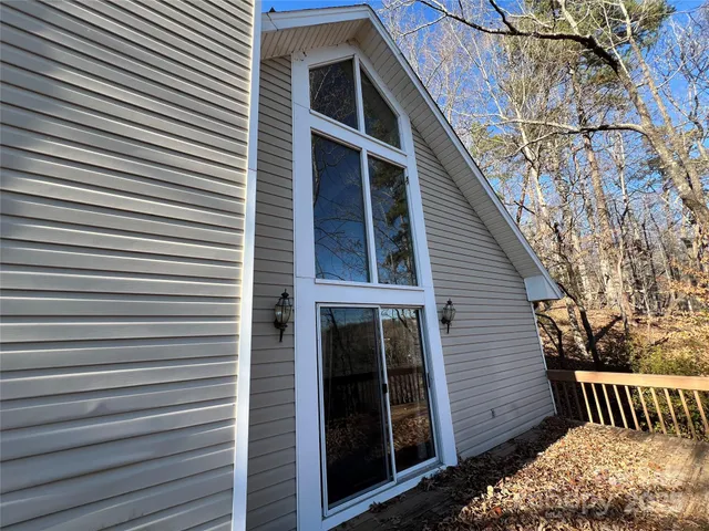a view of a backyard of the house