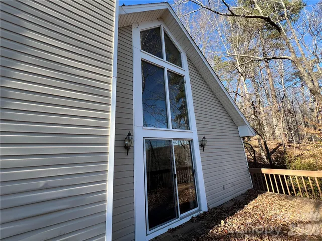 a view of a backyard of the house