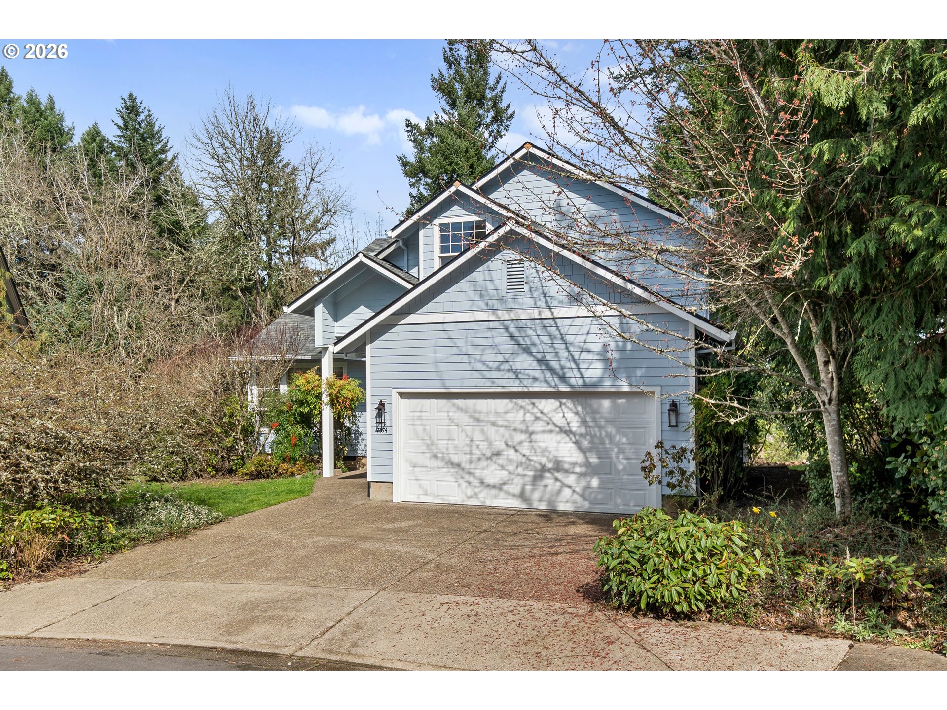 7574 Southwest 179th Place Beaverton, OR 97007 - Photo 2 of 48 a view of a house with a yard