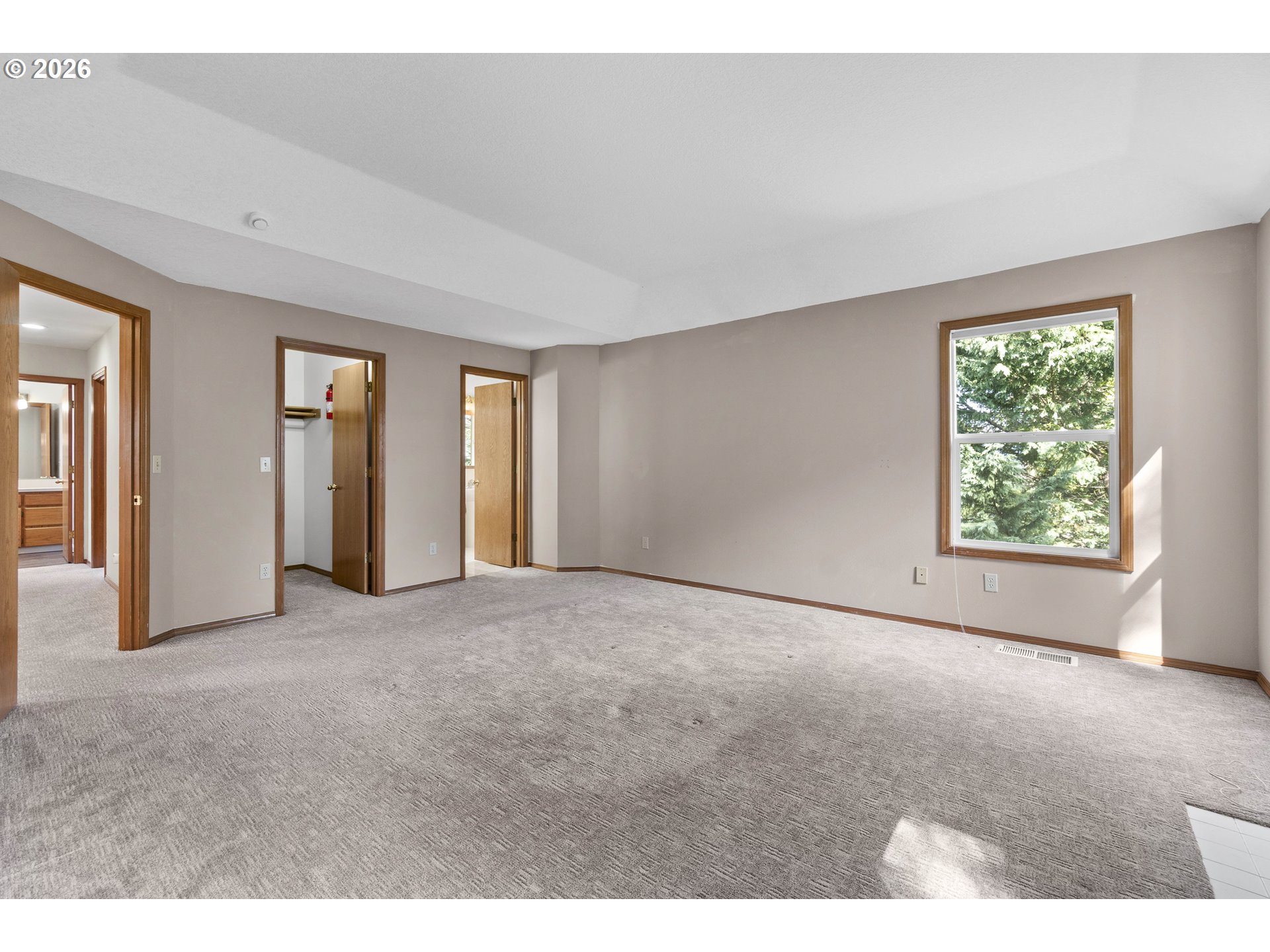 7574 Southwest 179th Place Beaverton, OR 97007 - Photo 25 of 48 a view of an empty room with a window
