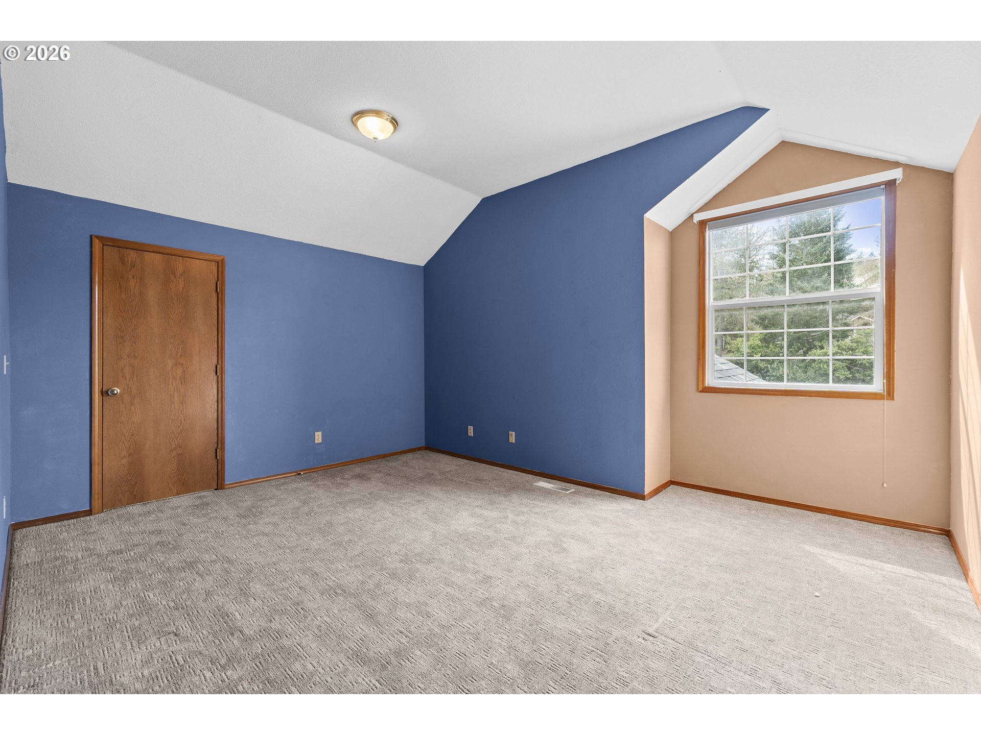 7574 Southwest 179th Place Beaverton, OR 97007 - Photo 29 of 48 a view of an empty room with a window