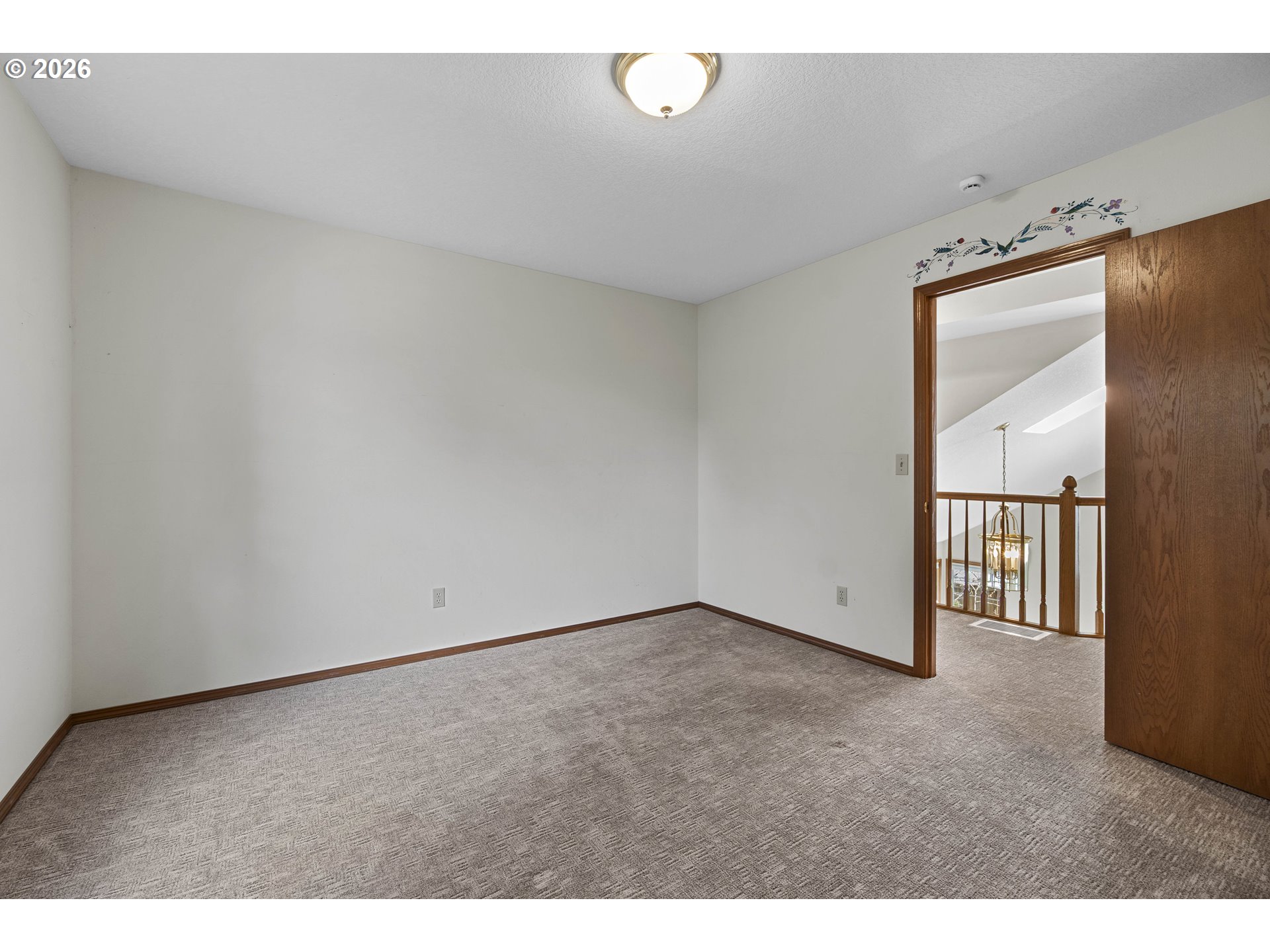 7574 Southwest 179th Place Beaverton, OR 97007 - Photo 32 of 48 a view of an empty room