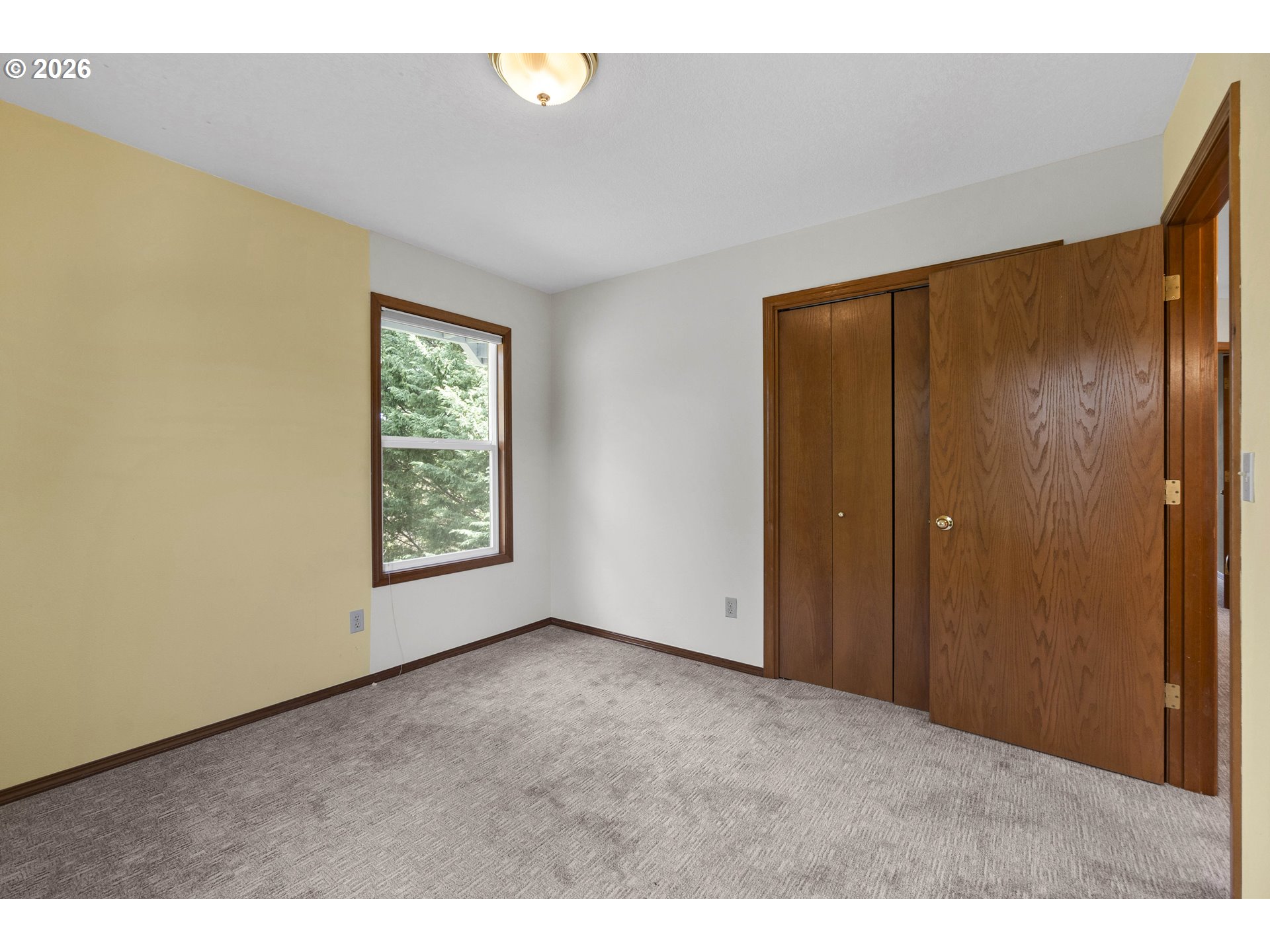7574 Southwest 179th Place Beaverton, OR 97007 - Photo 34 of 48 a view of an empty room with a window