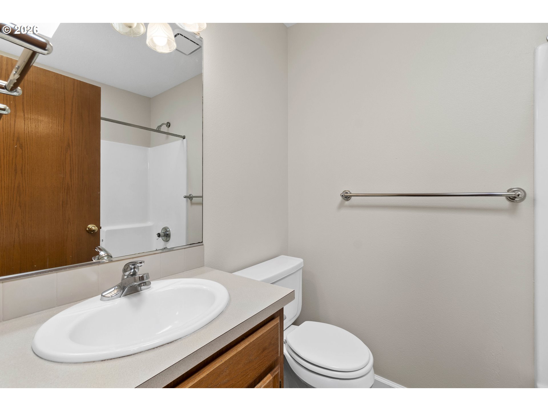 7574 Southwest 179th Place Beaverton, OR 97007 - Photo 36 of 48 a bathroom with a sink and a mirror