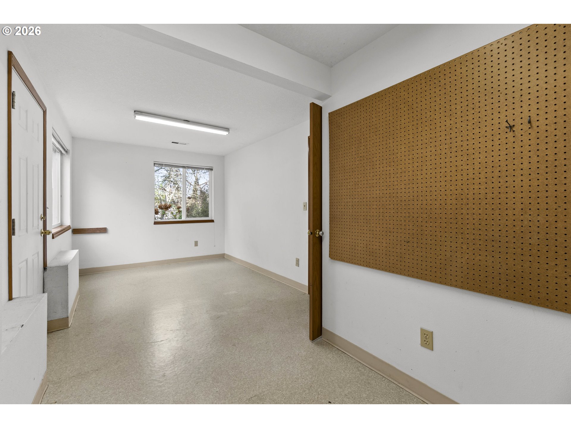 7574 Southwest 179th Place Beaverton, OR 97007 - Photo 42 of 48 a view of empty room with wooden floor