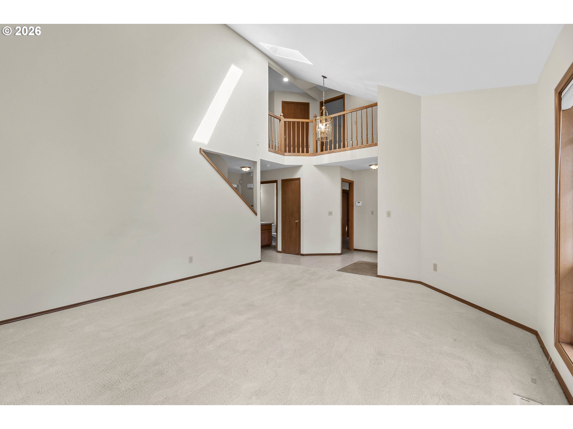 7574 Southwest 179th Place Beaverton, OR 97007 - Photo 8 of 48 a view of a big room with closet and windows