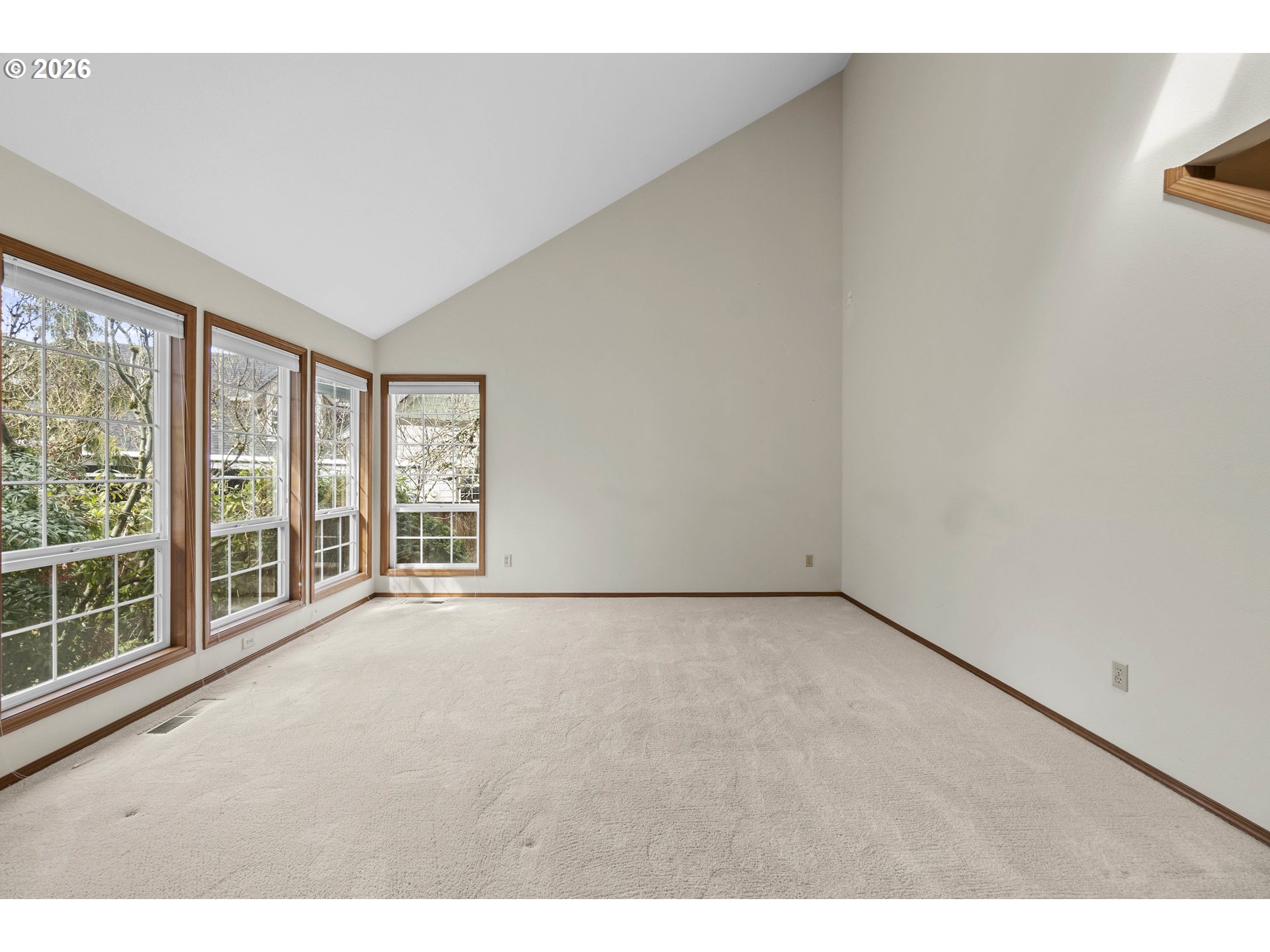 7574 Southwest 179th Place Beaverton, OR 97007 - Photo 9 of 48 a view of an empty room with a window