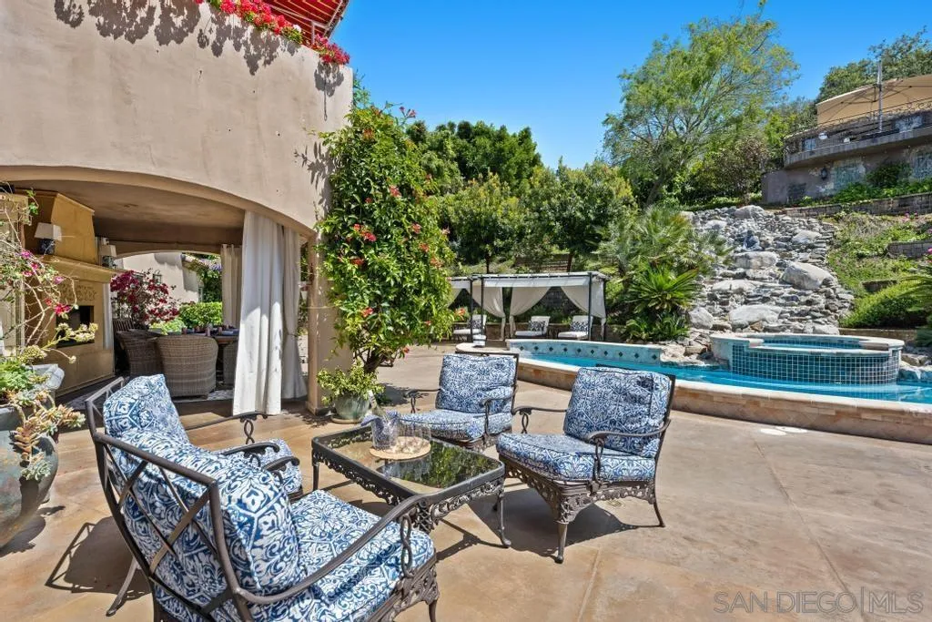2643 Hidden Valley Road La Jolla, CA 92037 - Photo 11 of 61 a view of a patio with couple of chairs and a table