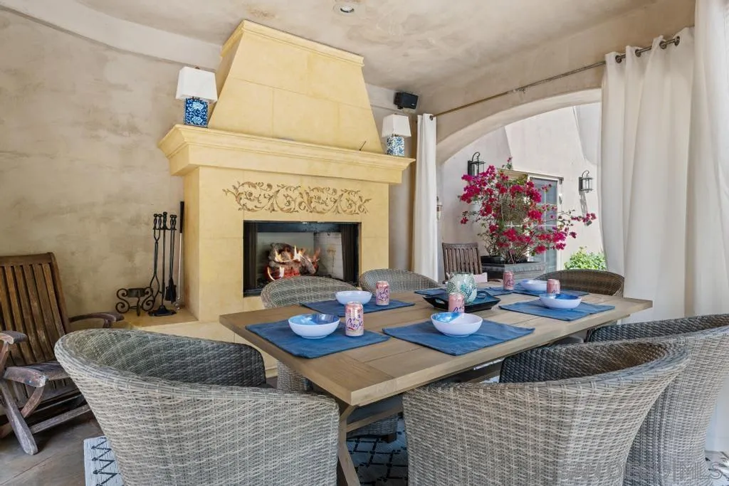 2643 Hidden Valley Road La Jolla, CA 92037 - Photo 13 of 61 a living room with furniture and a fireplace