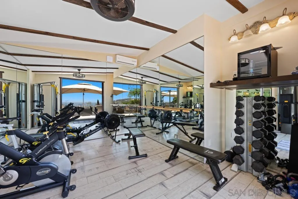 2643 Hidden Valley Road La Jolla, CA 92037 - Photo 18 of 61 a view of a room with gym equipment