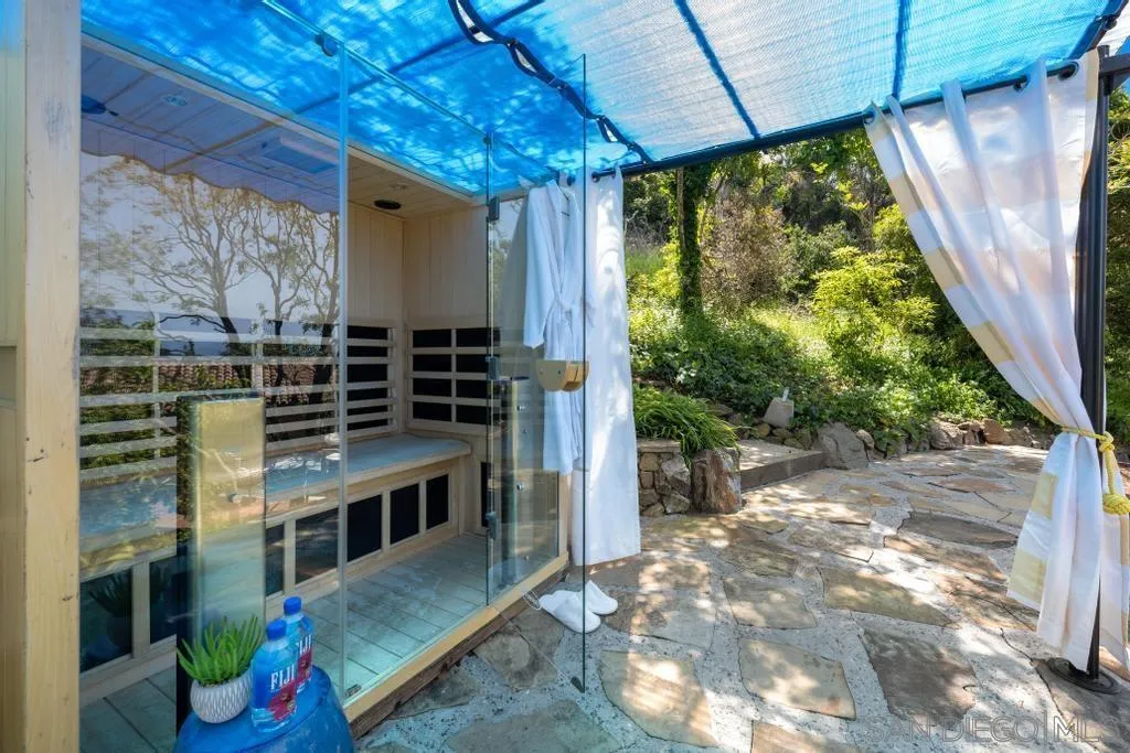 2643 Hidden Valley Road La Jolla, CA 92037 - Photo 19 of 61 a front view of a house with garden